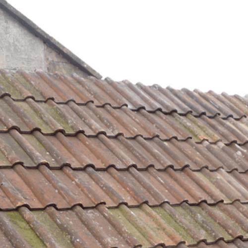 Roof repair and installation of new roof felt and treated battens on a roof in Bath before reclaimed clay double roman tiles were re-fitted by Robinson Building and Roofing Specialists.