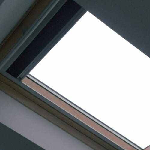 Skylight with cloudy sky view.